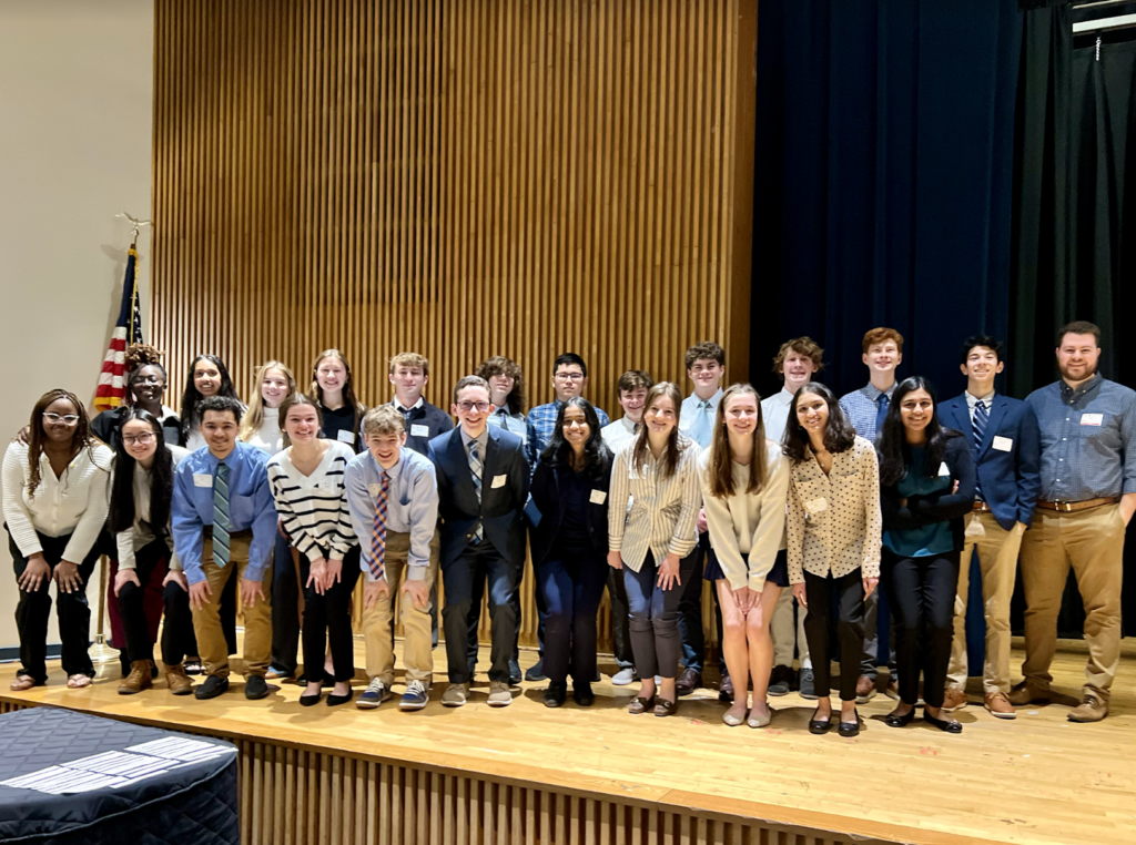 MTHS students posing on stage 